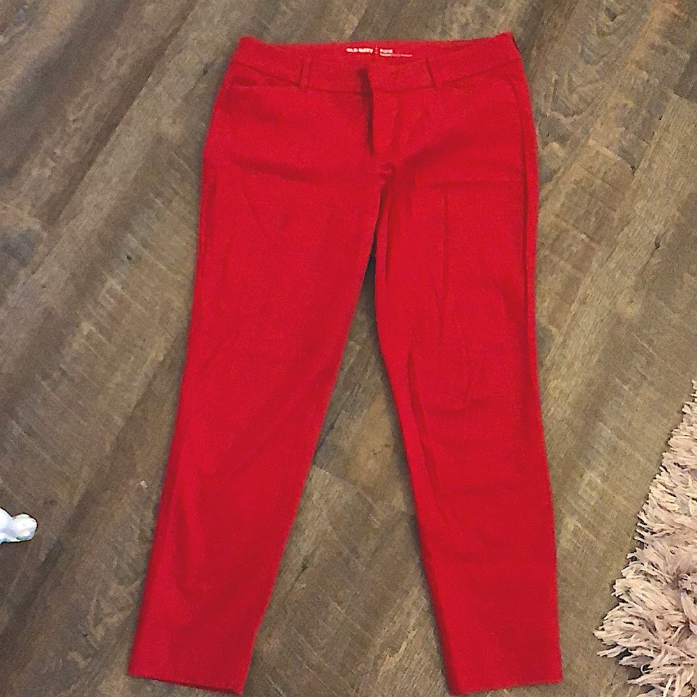 Red work trousers. Very stretchy and what I would consider mid rise. Very comfy.